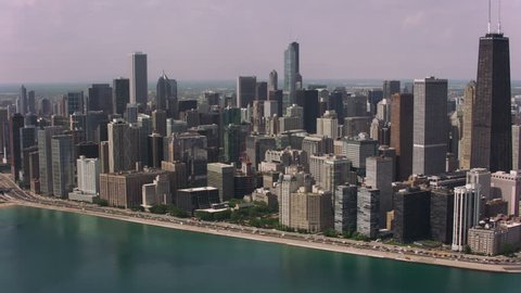 Chicago, Illinois circa-2017, Daytime aerial shot of downtown Chicago and Chicago Harbor. Shot with Cineflex and RED Epic-W Helium.