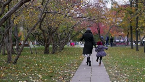 Young Woman Her Daughter Walks Around Stock Footage Video (100% Royalty