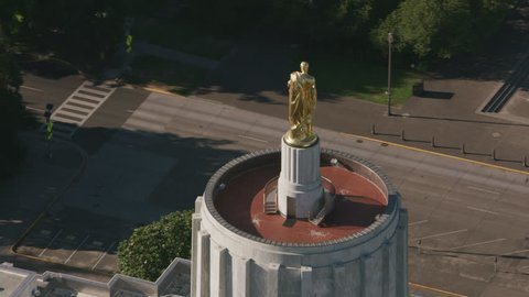 Salem, Oregon circa-2017, Aerial view of golden pioneer on top of Oregon State Capitol Building, Salem, Oregon. Shot with Cineflex and RED Epic-W Helium.