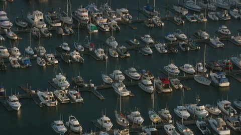 Newport, Oregon circa-2017, Aerial shot of boats docked in Yaquina Bay. Shot with Cineflex and RED Epic-W Helium.