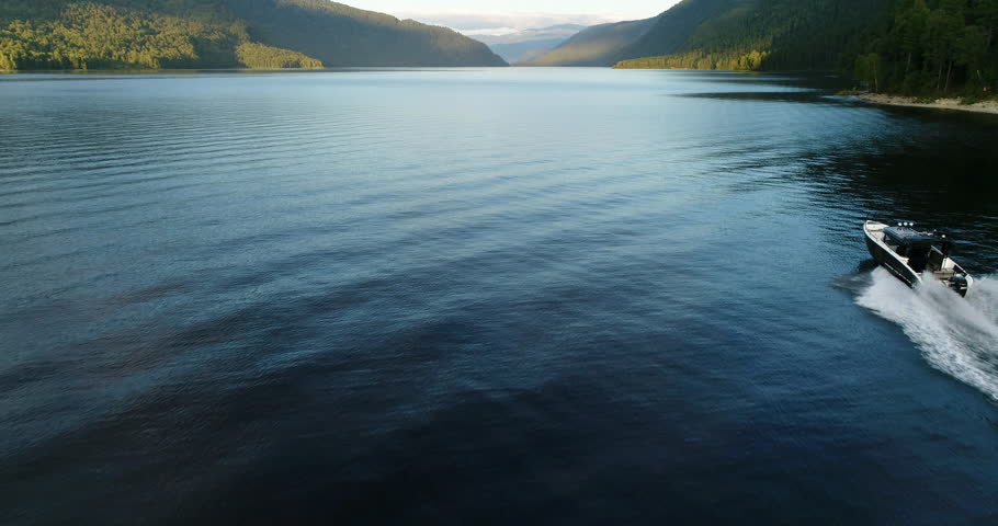 aerial view of speedboat on lake