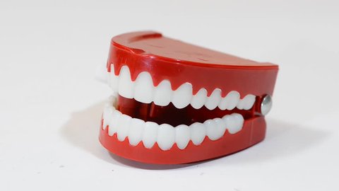 Funny False Teeth Moving Fast Stock Footage Video (100% Royalty-free)  31504888 | Shutterstock