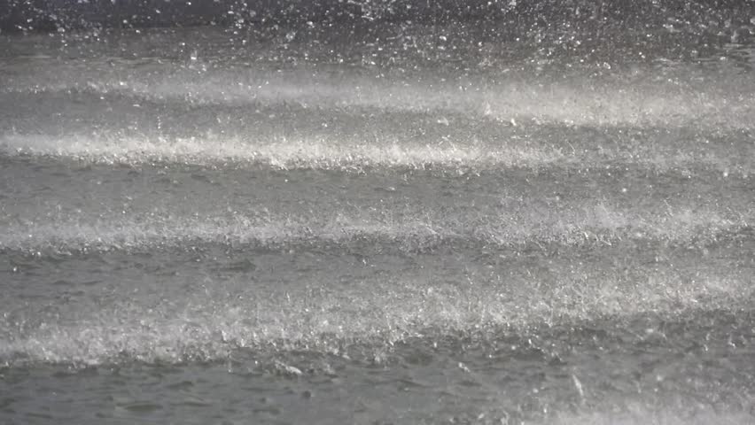 Slow motion water splashing in fountain
