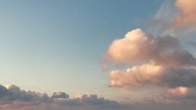 Clouds & sky motion time lapse, fluffy rolling, clip of white puffy weather over blue skies,  Flight over , loop-able, cloudscape, day, FHD. 1920x1080p.