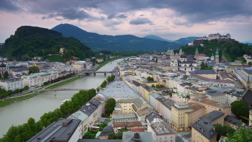 salzburg skyline timelapse from day to night aerial view