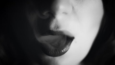 4k Close-up of Woman Mouth with Smoke, black and white