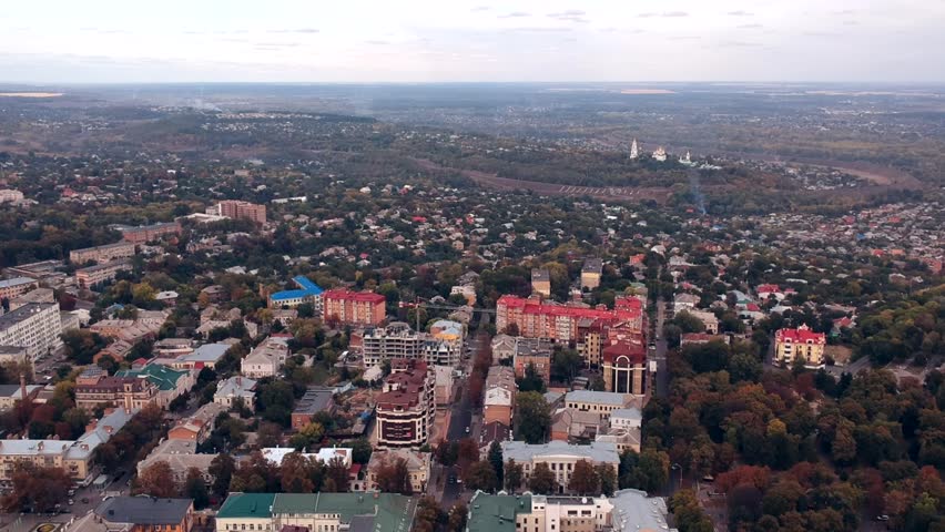 Aerial view on Poltava city, Ukraine. Old video style, low light evening autumn footage