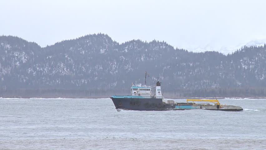 HOMER, AK - CIRCA 2012: An impressive and imposing heavy-duty tug/utility vessel