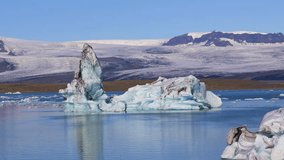 Stunning view of floating icebergs in the glacial lake Jokulsarlon, Iceland
