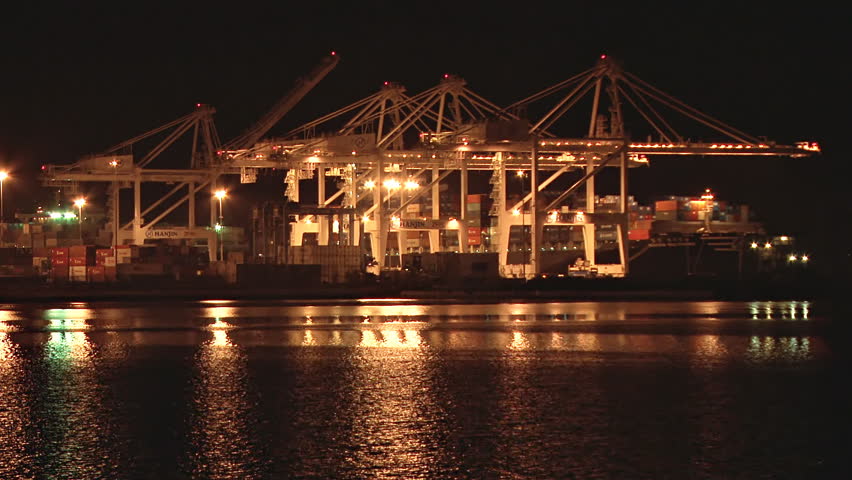 OAKLAND, CA - CIRCA 2012: Port of Oakland at night: Various shots depicting the