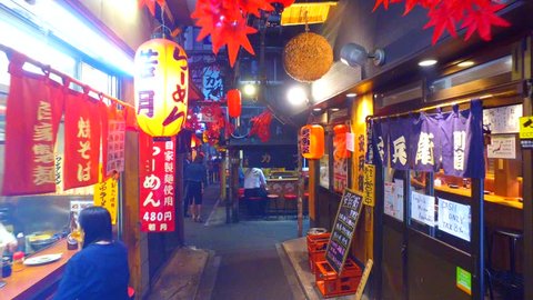 Tokyo, Japan - September 19, 2017 :Omoide-Yokocho in Shinjuku Tokyo at night.Both sides of alley are lined with izakaya bars and restaurants.