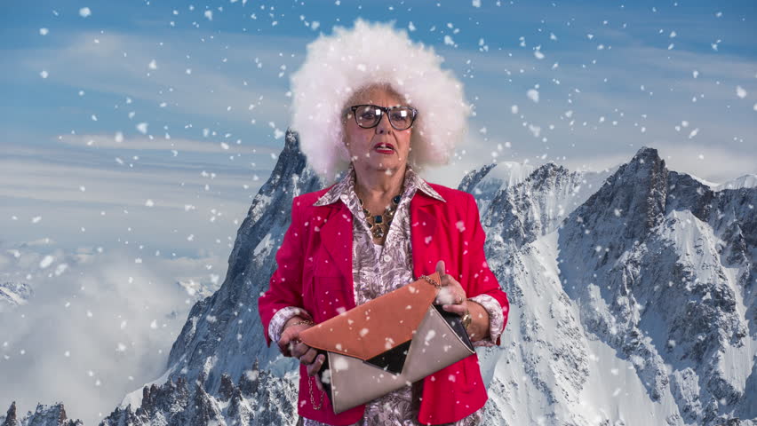 an elderly lady finds herself at the top of a mountain and looks lost and confused