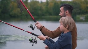 Happy father with son are fishing. - Powered by Shutterstock - Get 15% off with code: PIKWIZARD15
