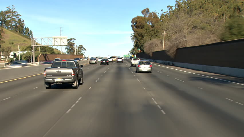 SAN RAFAEL, CA - CIRCA 2012: Driving POV, northbound in California on a light