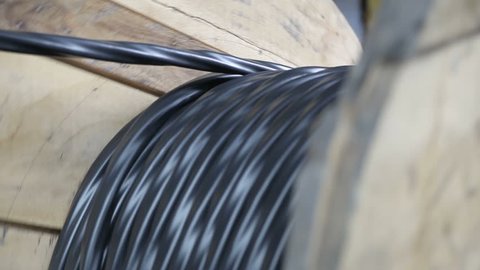 Winding of the electrical cable to the bobbin in the production