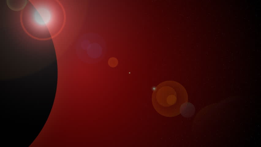 The sun emerges from behind the silhouetted Earth in space, giving off a red