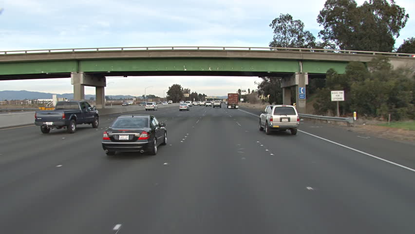 SACRAMENTO, CA - CIRCA 2012: In moderate traffic, traveling toward Sacramento