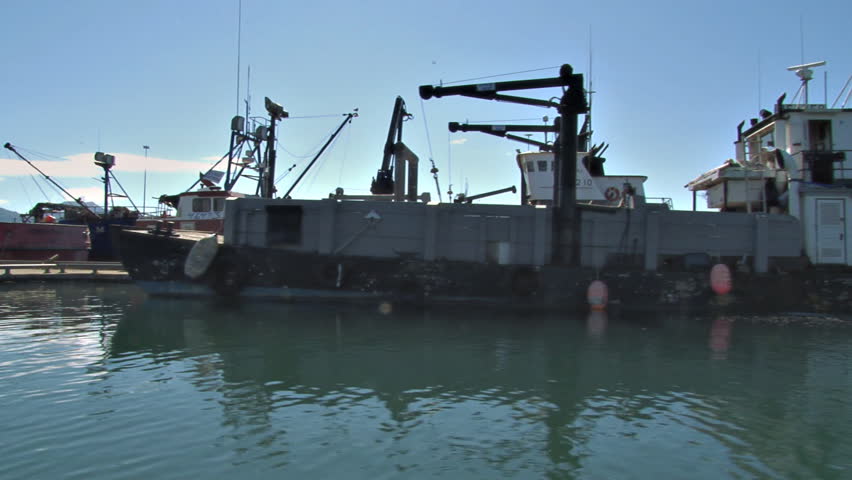 HOMER, AK - CIRCA 2012: Utility boats, cargo boats, landing craft, fishing