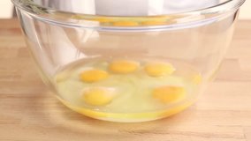 Eggs and sugar being mixed with an electric whisk