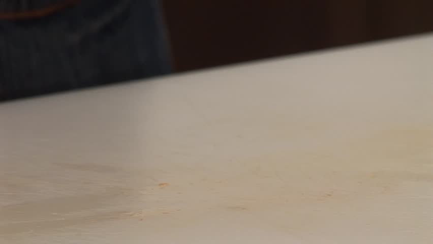 Chopping a clove of garlic