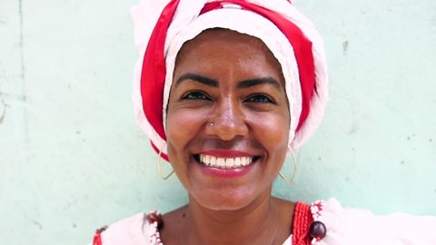 Portrait of Brazilian Woman, dressed in traditional Baiana attire in Salvador, Bahia, Brazil