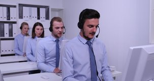 Friendly Financial Advice Team Taking Calls in Busy Call Center Consultation