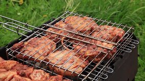 Chicken meat on barbecue grill smoke