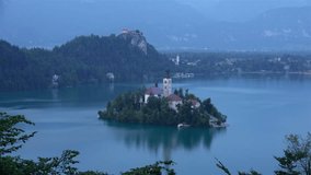 Aerial View on Island Bled in the Evening. 4K Ultra HD 3840x2160 Video Clip