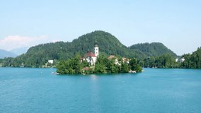 Scenic view of Church on the Island Bled in the Julian Alps in Slovenia. 4K Ultra HD 3840x2160 Video Clip