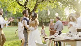 Wedding reception outside in the backyard. - Powered by Shutterstock - Get 15% off with code: PIKWIZARD15