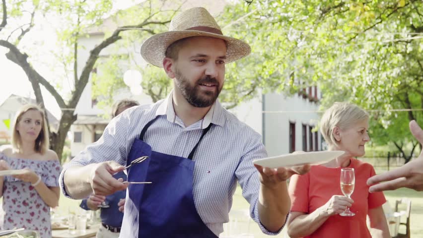 Family celebration or a barbecue party outside in the backyard.