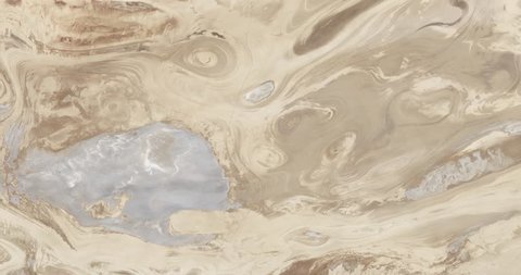Very high-altitude overflight aerial of desert landscapes in Iran's Central Basin. Clip loops and is reversible. Elements of this image furnished by NASA