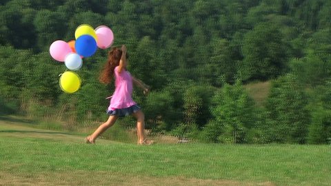 Girl Skipping with Balloons 