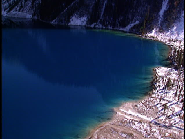 Aerial shot of sun reflection in Lake Gloria Banff National Park Canada
