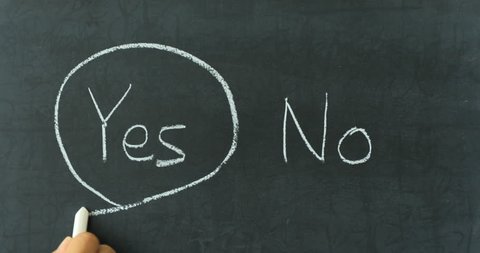  Yes or No decision making - choosing YES on chalkboard