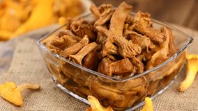 Rotating canned Chanterelles (as 4K UHD footage; seamless loopable)