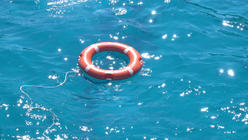 life buoy over blue calm sea water background. Royalty-Free Stock Footage #31635223