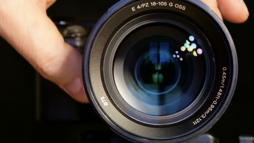 Shooting close-up, lens with moving lenses, zoom. Royalty-Free Stock Footage #31635868