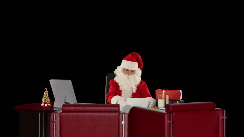 Santa Claus reading letters, against black
