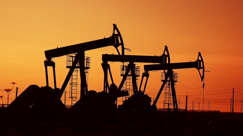 Many crude petroleum naphta drilling extraction pumps under the sunset red sky on oil field industrial platform | Shutterstock HD Video #31639999