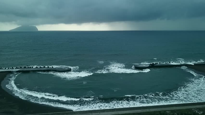 Aerial view of huge ocean waves in WuShi Harbor, TouCheng, YiLan, Taiwan