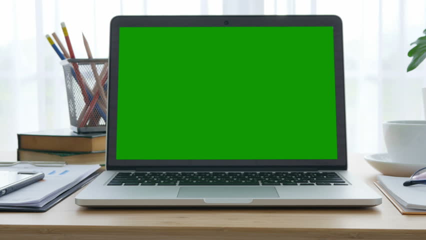4K : A laptop computer with a key green screen set on work office table. Royalty-Free Stock Footage #31644223