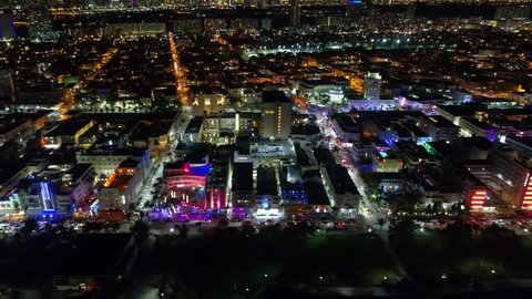 Lateral aerial shot Ocean Drive Miami Beach night 4k