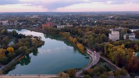Aerial view on Mirgorod city, Ukraine. Old video style, low light evening sunset autumn footage