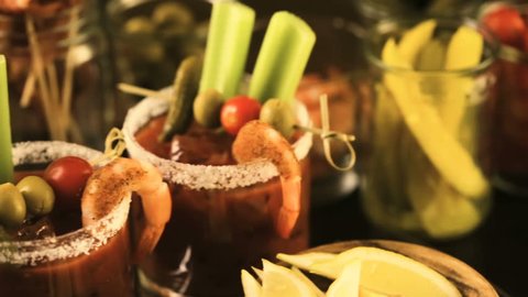 Bloody mary cocktail bar with variety of garnishes.
