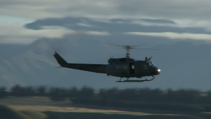 An Iroquois helicopter in low level flight