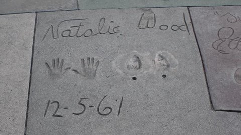 HOLLYWOOD, CA - CIRCA 2011: Boot prints and hand prints of Natalie Wood at Graumann's Chinese Theater in Hollywood, California.