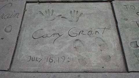 HOLLYWOOD, CA - CIRCA 2011: Boot prints and hand prints of Cary Grant at Graumann's Chinese Theater in Hollywood, California.