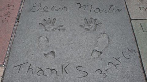 HOLLYWOOD, CA - CIRCA 2011: Boot prints and hand prints of Dean Martin  at Graumann's Chinese Theater in Hollywood, California.