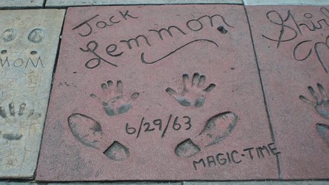 HOLLYWOOD, CA - CIRCA 2011: Jack Lemmon's hand and footprints at Grauman's Chinese Theater on Hollywood Boulevard in Hollywood, California.
